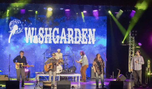 Wishgarden band stretched across stage.