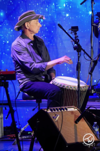 Wishgarden Djemba player Bob Mozik, on stage.