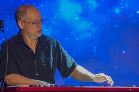 Wishgarden keyboard player Joe Wayand on stage.