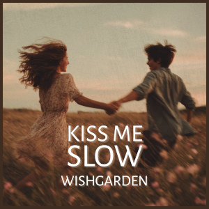 Wishgarden single Kiss Me Slow , young couple holding hands and running in flower-strewn field.